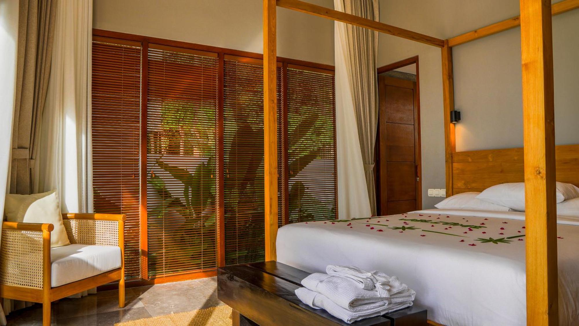 Sanglung Villas & Suites Кубутамбахан Номер фото