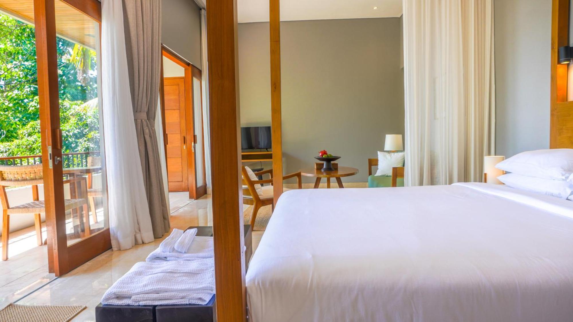 Sanglung Villas & Suites Кубутамбахан Номер фото