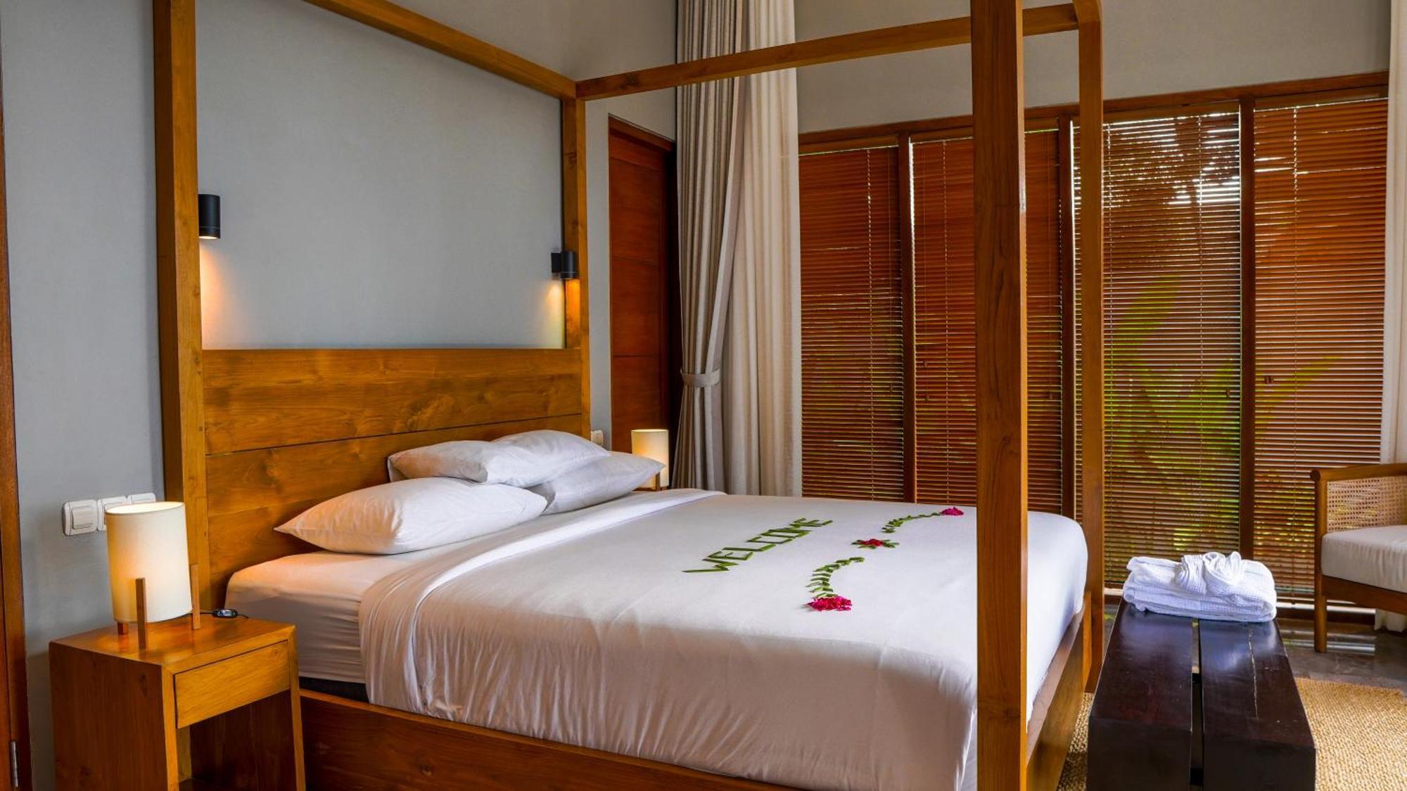 Sanglung Villas & Suites Кубутамбахан Номер фото